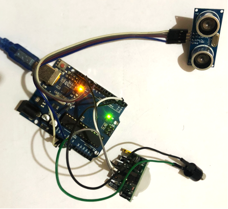 KEAMANAN DENGAN SENSOR PIR DAN ULTRASONIK